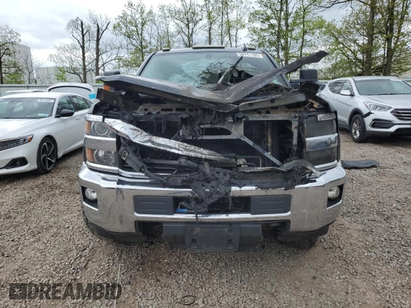 2015 Chevrolet Silverado 3500HD LT z VIN 1GC4KZCG5FF671954, wystawiony jako Copart lot #56741195 z przebiegiem Nie podano mil oraz Szkoda całkowita • Salvage title. Historia ofert i sprzedaży dostępna na DreamBid. Obrazek 5.