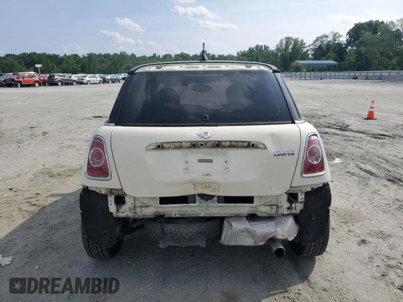 2013 MINI Hardtop с VIN WMWSU3C57DT681944, выставлен на аукционе Copart как лот 60126245 с пробегом 118 319 миль миль и Списание • Salvage title. История ставок и продаж доступна на DreamBid. Изображение 6.