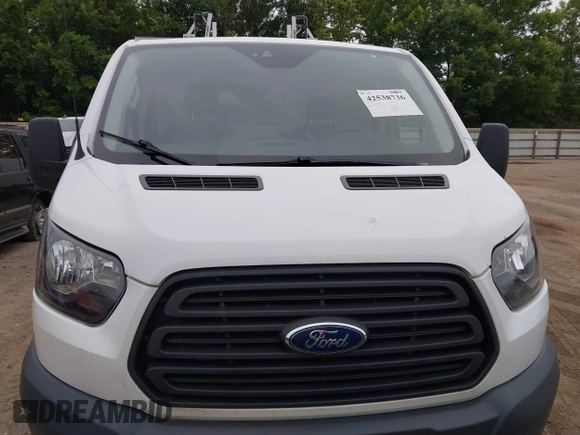 2018 Ford Transit z VIN 1FTYE1ZM2JKB56191, wystawiony jako IAAI lot #42538736 z przebiegiem 204 436 mil mil oraz . Historia ofert i sprzedaży dostępna na DreamBid. Obrazek 6.