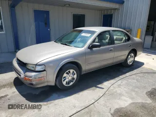 1998 Nissan Maxima GXE z VIN JN1CA21D0WT525657, wystawiony jako Copart lot #57055485 z przebiegiem Nie podano mil oraz Szkoda całkowita • Salvage title. Historia ofert i sprzedaży dostępna na DreamBid. Obrazek 1.