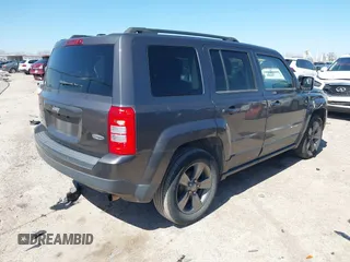 2014 Jeep Patriot Latitude with VIN 1C4NJPFA3ED928123, listed as a IAAI auction lot 41767231 with 136,318 mi miles and . Bid and sale history available at carsss.com. Image 4.