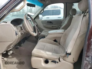 2001 Ford F-150 XL with VIN 1FTRX18L61NB40999, listed as a Copart auction lot 49641305 with 216,452 mi miles and Salvage Title. Bid and sale history available at carsss.com. Image 7.