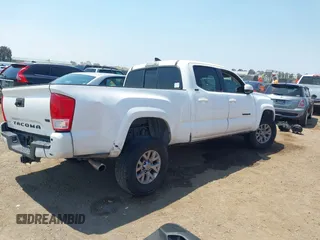 2017 Toyota Tacoma SR5 with VIN 3TMBZ5DN3HM008801, listed as a IAAI auction lot 42660672 with 132,871 mi miles and . Bid and sale history available at DreamBid. Image 4.