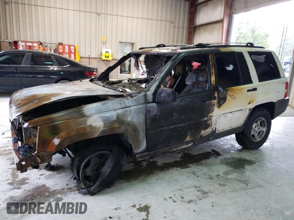 1998 Jeep Grand Cherokee Laredo with VIN 1J4GZ58S2WC222595, listed as a Copart auction lot 51108625 with 0 mi miles and Salvage Title. Bid and sale history available at carsss.com. Image 1.
