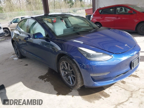 2022 Tesla Model 3 Long Range with VIN 5YJ3E1EB3NF267365, listed as a IAAI auction lot 41996594 with 32,687 mi miles and . Bid and sale history available at DreamBid. Image 1.