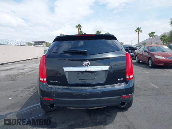 2014 Cadillac SRX Luxury Collection z VIN 3GYFNEE30ES650372, wystawiony jako IAAI lot #42195783 z przebiegiem 169 113 mil mil oraz . Historia ofert i sprzedaży dostępna na DreamBid. Obrazek 16.