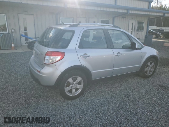 2010 Suzuki SX4 Touring with VIN JS2YB5A73A6300609, listed as a Copart auction lot 45541075 with 140,641 mi miles and Salvage Title. Bid and sale history available at carsss.com. Image 3.