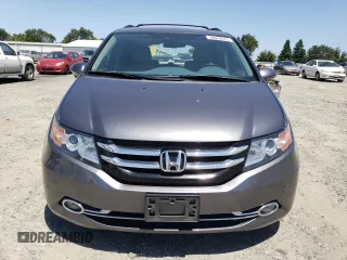 2014 Honda Odyssey Touring с VIN 5FNRL5H92EB116923, выставлен на аукционе Copart как лот 58060645 с пробегом 106 285 миль миль и Списание • Salvage title. История ставок и продаж доступна на DreamBid. Изображение 5.
