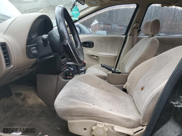 1999 Saturn SL with VIN 1G8ZK5278XZ101859, listed as a Copart auction lot 83020254 with 0 mi miles and Salvage Title. Bid and sale history available at carsss.com. Image 7.