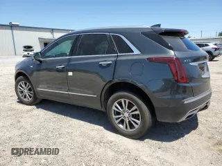 2023 Cadillac XT5 FWD Premium Luxury z VIN 1GYKNCRS0PZ173923, wystawiony jako Copart lot #52212695 z przebiegiem Nie podano mil oraz Szkoda całkowita • Salvage title. Historia ofert i sprzedaży dostępna na DreamBid. Obrazek 2.
