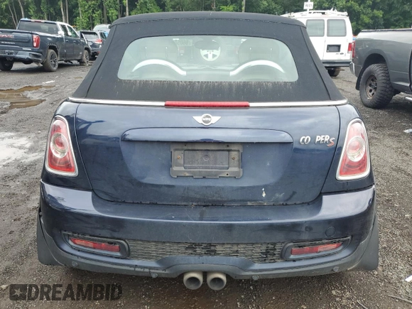 2012 MINI Convertible S z VIN WMWZP3C53CT550188, wystawiony jako Copart lot #88769895 z przebiegiem 130 696 mil mil oraz Nie do naprawy • Non repairable. Historia ofert i sprzedaży dostępna na DreamBid. Obrazek 6.