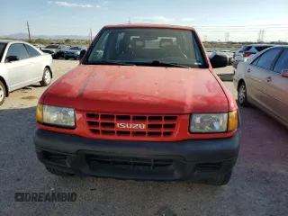 1999 Isuzu Rodeo z VIN 4S2CK57W3X4301044, wystawiony jako Copart lot #75758024 z przebiegiem 209 456 mil mil oraz Tytuł czysty. Historia ofert i sprzedaży dostępna na DreamBid. Obrazek 5.
