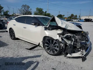 2016 Nissan Maxima SR with VIN 1N4AA6AP5GC421677, listed as a Copart auction lot 58738515 with 140,920 mi miles and Salvage title. Bid and sale history available at DreamBid. Image 4.