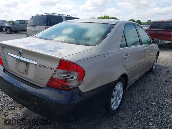 2004 Toyota Camry LE with VIN 4T1BF30K24U570599, listed as a IAAI auction lot 42107715 with 324,191 mi miles and . Bid and sale history available at DreamBid. Image 6.