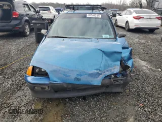 1990 Geo Metro z VIN 2C1MR2465L6014681, wystawiony jako Copart lot #82309254 z przebiegiem 95 146 mil mil oraz Szkody całkowita. Historia ofert i sprzedaży dostępna na DreamBid. Obrazek 5.