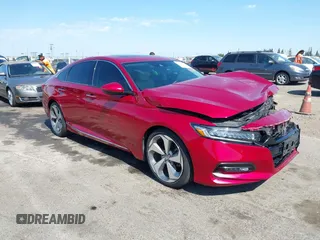 2018 Honda Accord Touring with VIN 1HGCV1F97JA030880, listed as a IAAI auction lot 42643079 with 72,307 mi miles and . Bid and sale history available at DreamBid. Image 1.