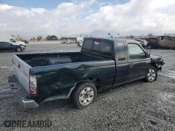 1999 Nissan Frontier XE with VIN 1N6DD26S6XC332458, listed as a Copart auction lot 48028715 with 182,706 mi miles and Salvage title. Bid and sale history available at DreamBid. Image 3.