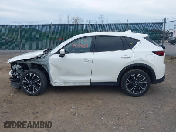 2022 Mazda CX-5 2.5 S Premium Plus Package with VIN JM3KFBEM2N0616960, listed as a IAAI auction lot 42127024 with 30,565 mi miles. Bid and sale history available at carsss.com. Image 15.