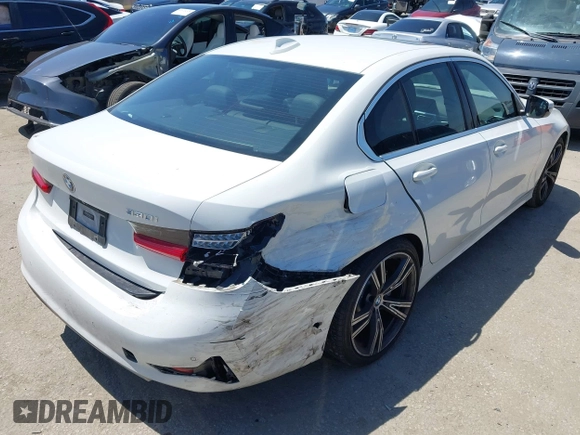 2020 BMW 3 Series 330i z VIN 3MW5R1J01L8B05556, wystawiony jako IAAI lot #42299891 z przebiegiem 61 404 mil mil oraz . Historia ofert i sprzedaży dostępna na DreamBid. Obrazek 4.
