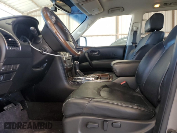 2016 Infiniti QX80 with VIN JN8AZ2NF0G9610963, listed as a Copart auction lot 47184895 with 183,836 mi miles and Salvage title. Bid and sale history available at DreamBid. Image 7.