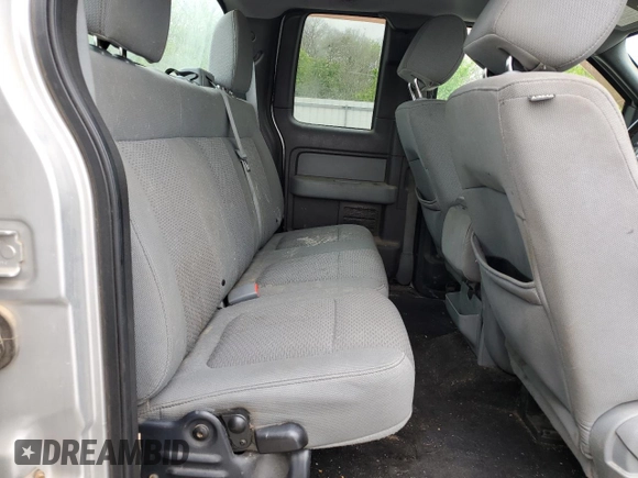 2012 Ford F-150 XL with VIN 1FTFX1EF2CFA00320, listed as a Copart auction lot 51511465 with 228,571 mi miles and Salvage title. Bid and sale history available at DreamBid. Image 11.