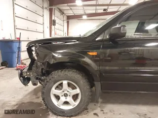 2007 Honda Pilot LX with VIN 5FNYF18117B009290, listed as a IAAI auction lot 41205310 with 150,081 mi miles. Bid and sale history available at carsss.com. Image 19.