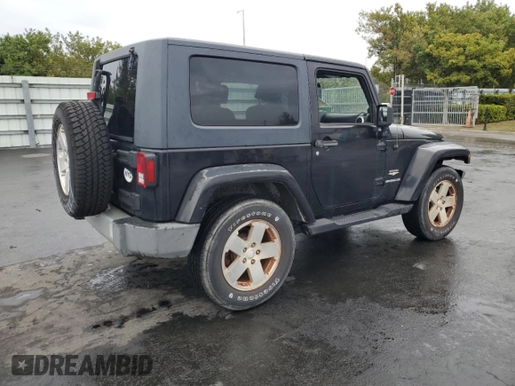 2009 Jeep Wrangler Sahara with VIN 1J4FA54109L702963, listed as a Copart auction lot 89211555 with 125,138 mi miles and Clean title. Bid and sale history available at DreamBid. Image 3.