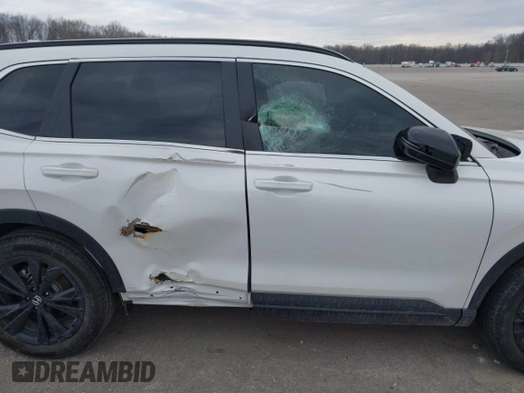 2025 Honda CR-V Sport Touring with VIN 7FARS6H9XSE043583, listed as a IAAI auction lot 41705098 with 6,020 mi miles and . Bid and sale history available at DreamBid. Image 6.