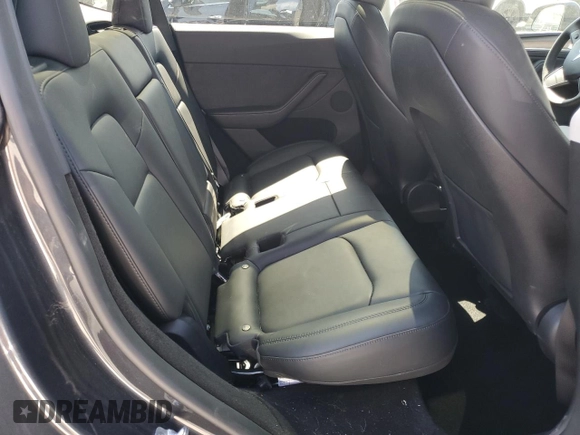 2024 Tesla Model Y Long Range z VIN 7SAYGDEE5RA244641, wystawiony jako Copart lot #51864845 z przebiegiem 23 096 mil mil oraz Szkoda całkowita • Salvage title. Historia ofert i sprzedaży dostępna na DreamBid. Obrazek 11.