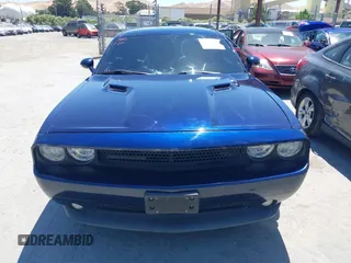 2013 Dodge Challenger R/T z VIN 2C3CDYBT9DH565280, wystawiony jako IAAI lot #42315527 z przebiegiem 128 638 mil mil oraz . Historia ofert i sprzedaży dostępna na DreamBid. Obrazek 12.
