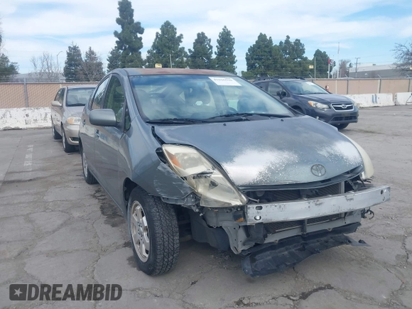 2005 Toyota Prius z VIN JTDKB20UX53123196, wystawiony jako IAAI lot #41626598 z przebiegiem 216 895 mil mil oraz . Historia ofert i sprzedaży dostępna na DreamBid. Obrazek 1.