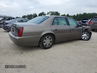 2000 Cadillac DeVille DTS z VIN 1G6KF5794YU249059, wystawiony jako Copart lot #71614494 z przebiegiem 121 611 mil mil oraz Szkoda całkowita • Salvage title. Historia ofert i sprzedaży dostępna na DreamBid. Obrazek 3.