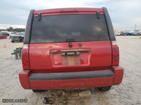 2010 Jeep Commander Sport with VIN 1J4RH4GK9AC115737, listed as a Copart auction lot 83028054 with 0 mi miles and Salvage Title. Bid and sale history available at carsss.com. Image 6.