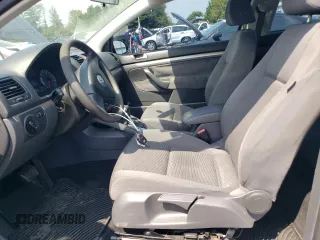 2009 Volkswagen Rabbit S z VIN WVWBA71K29W137045, wystawiony jako Copart lot #68855164 z przebiegiem 205 333 mil mil oraz Szkoda całkowita • Salvage title. Historia ofert i sprzedaży dostępna na DreamBid. Obrazek 7.
