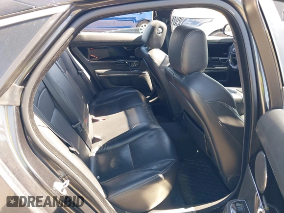 2015 Jaguar XJ R-Sport with VIN SAJWJ1CD6F8V83990, listed as a IAAI auction lot 41936162 with Not Provided miles and . Bid and sale history available at DreamBid. Image 8.
