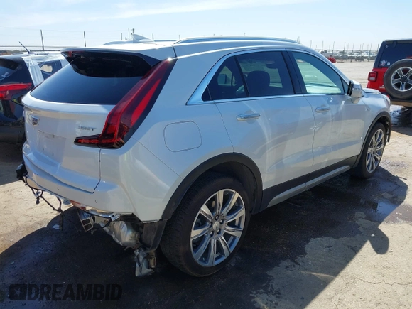 2022 Cadillac XT4 FWD Premium Luxury с VIN 1GYFZCR41NF169224, выставлен на аукционе IAAI как лот 41864717 с пробегом 34 183 миль миль и . История ставок и продаж доступна на DreamBid. Изображение 4.