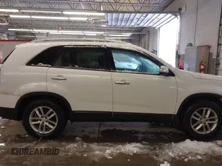 2015 Kia Sorento LX with VIN 5XYKT4A79FG585120, listed as a IAAI auction lot 41533779 with 127,337 mi miles. Bid and sale history available at carsss.com. Image 13.