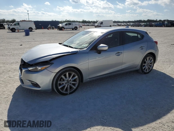 2017 Mazda 3 Grand Touring with VIN JM1BN1M33H1105397, listed as a Copart auction lot 86052334 with 21,578 mi miles and Salvage Title. Bid and sale history available at DreamBid. Image 1.