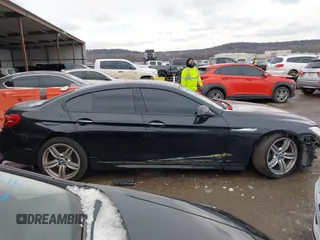 2015 BMW 6 Series 640i with VIN WBA6A0C55FGB53603, listed as a IAAI auction lot 41543996 with 71,046 mi miles and . Bid and sale history available at DreamBid. Image 14.