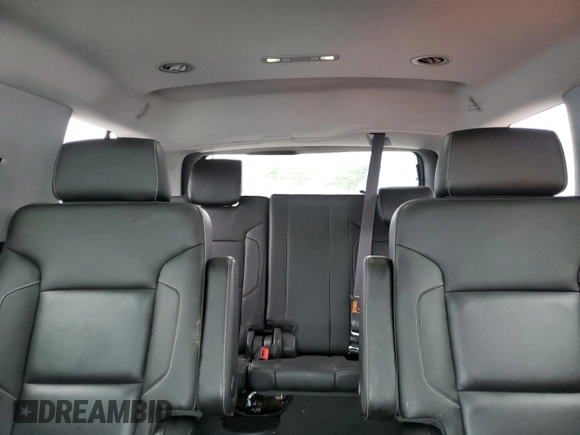 2015 Chevrolet Tahoe LTZ z VIN 1GNSKCKC5FR100084, wystawiony jako Copart lot #57677825 z przebiegiem 141 987 mil mil oraz Czysty tytuł • Clean title. Historia ofert i sprzedaży dostępna na DreamBid. Obrazek 10.