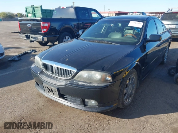 2003 Lincoln LS Sport z VIN 1LNHM87A33Y689084, wystawiony jako IAAI lot #41023405 z przebiegiem 205 200 mil mil oraz . Historia ofert i sprzedaży dostępna na DreamBid. Obrazek 6.