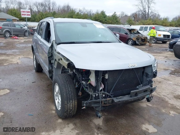 2015 Jeep Grand Cherokee Altitude with VIN 1C4RJFAG0FC657942, listed as a IAAI auction lot 41899793 with 102,277 mi miles. Bid and sale history available at carsss.com. Image 1.