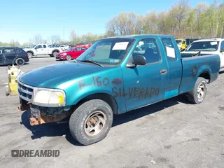 1997 Ford F-150 z VIN 1FTDX1768VNA88478, wystawiony jako IAAI lot #42080621 z przebiegiem 159 160 mil mil oraz . Historia ofert i sprzedaży dostępna na DreamBid. Obrazek 2.