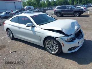 2015 BMW 4 Series 428i xDrive with VIN WBA3N5C52FK484864, listed as a IAAI auction lot 42569077 with 95,431 mi miles and . Bid and sale history available at DreamBid. Image 1.
