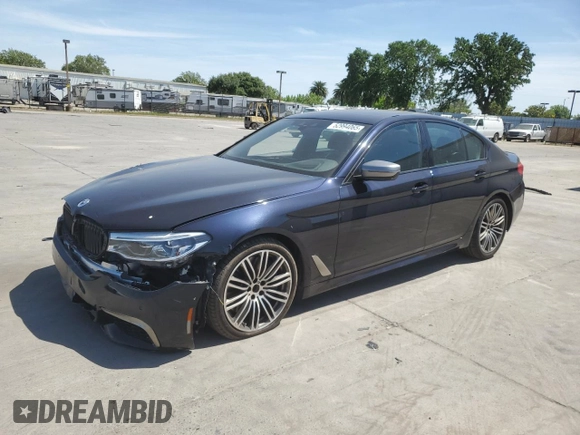 2019 BMW 5 Series M550i xDrive with VIN WBAJB9C5XKB287877, listed as a Copart auction lot 52994065 with 52,460 mi miles and Salvage title. Bid and sale history available at DreamBid. Image 1.