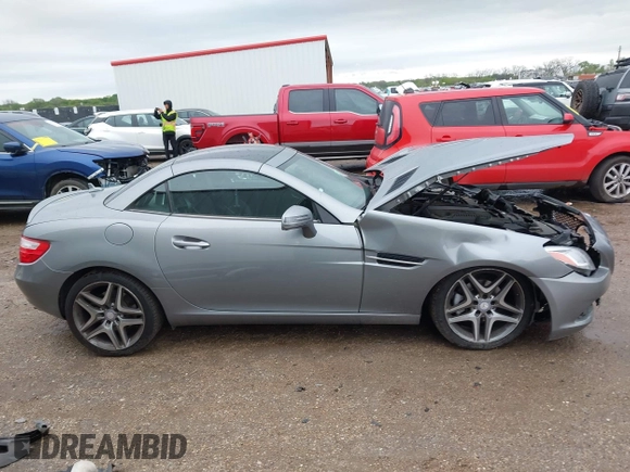 2014 Mercedes-Benz SLK 250 with VIN WDDPK4HA6EF084283, listed as a IAAI auction lot 41927893 with 32,143 mi miles and . Bid and sale history available at DreamBid. Image 13.