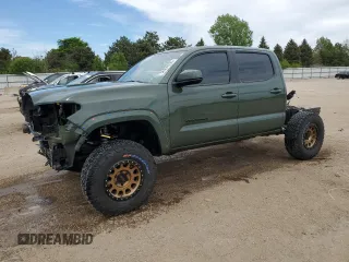 2022 Toyota Tacoma SR z VIN 3TMCZ5AN3NM511541, wystawiony jako Copart lot #56299195 z przebiegiem 33 427 mil mil oraz Szkoda całkowita • Salvage title. Historia ofert i sprzedaży dostępna na DreamBid. Obrazek 1.