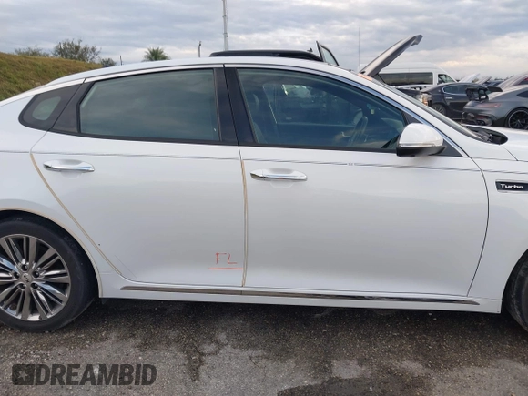 2018 Kia Optima SX with VIN 5XXGV4L21JG182103, listed as a IAAI auction lot 40522762 with 60,542 mi miles and . Bid and sale history available at DreamBid. Image 13.