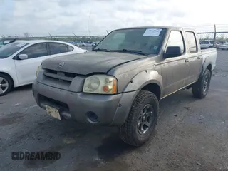 2003 Nissan Frontier XE z VIN 1N6ED27T13C404348, wystawiony jako IAAI lot #41952112 z przebiegiem Nie podano mil oraz . Historia ofert i sprzedaży dostępna na DreamBid. Obrazek 2.