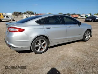 2013 Ford Fusion SE Hybrid z VIN 3FA6P0LU8DR325849, wystawiony jako Copart lot #53520515 z przebiegiem 93 615 mil mil oraz Czysty tytuł • Clean title. Historia ofert i sprzedaży dostępna na DreamBid. Obrazek 3.